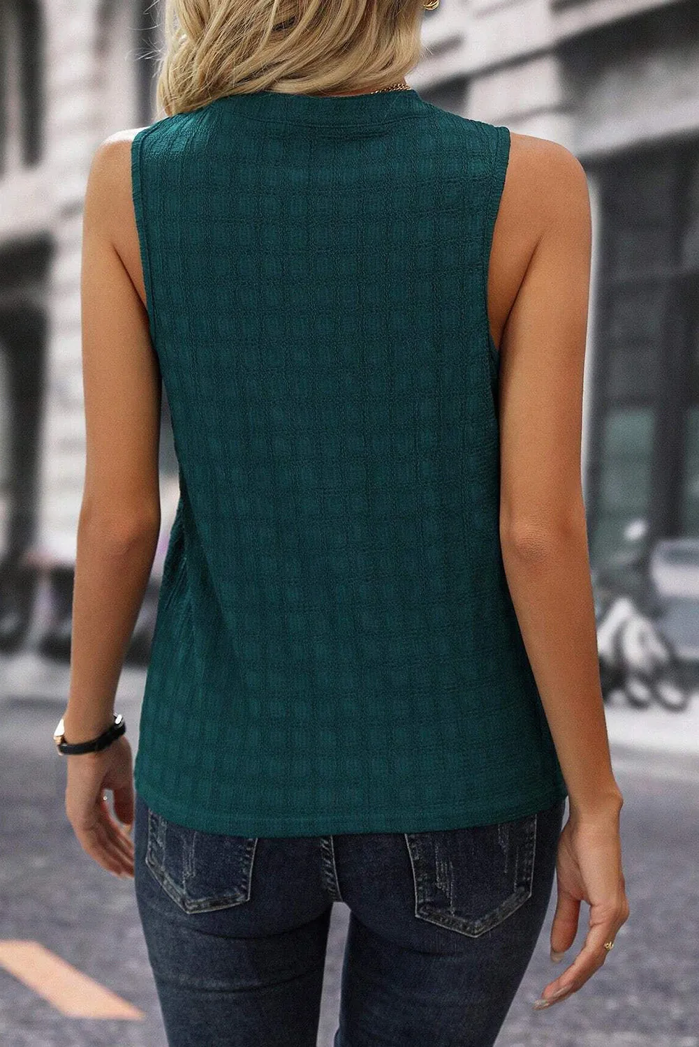 Explore More  Collection - Solid Notched Sleeveless Blouse